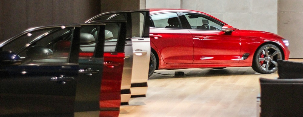 image-of-car-and-car-doors-in-a-showroom-to-accompany-vxtream-blog-post-on-ransomware-in-automotive-industry