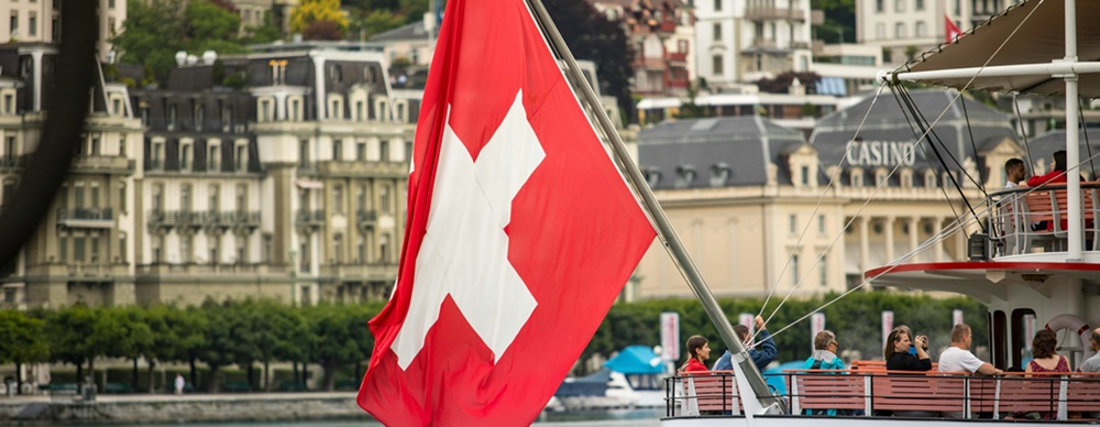 Swiss-national-flag-hanging-from-boat-to-illustrate-vxtream-article-on-data-centres-in-Switzerland