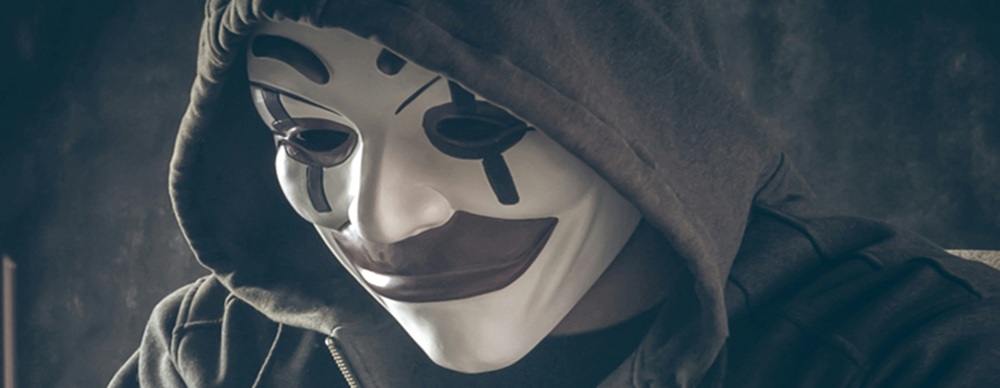 image-of-hacker-wearing-a-clown-mask-to-illustrate-article-on-cyber-resilience